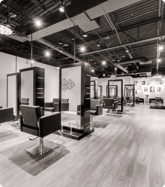 Salon owner looking at a phone